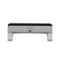 Soporte Vertical para Laptop / Adecuado para escritorio / Anchura Ajustable (12-26mm) / Amplia compatibilidad / Anti-Arañazos / Anti-Deslizante /Ajustable Mediante Tornillos / Color Plata / Aluminio + Silicona