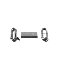 Conmutador USB para Compartir 4 Puertos USB 3.0 a 2 PC ́s | Cambio Mediante Botón | Incluye Dos Cables USB de 1.5 m | ABS | Permite que 2 Usuarios Compartan 4 Dispositivos Periféricos USB3.0, como una impresora, un escáner, etc.