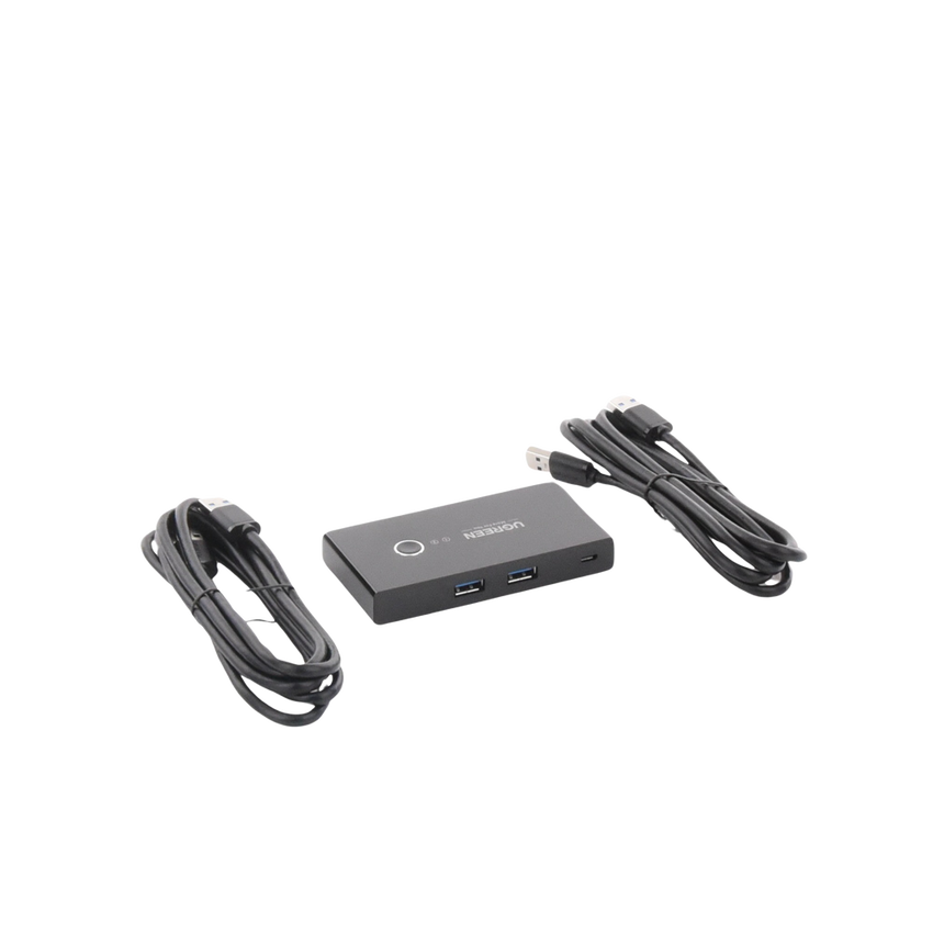 Conmutador USB para Compartir 4 Puertos USB 3.0 a 2 PC ́s | Cambio Mediante Botón | Incluye Dos Cables USB de 1.5 m | ABS | Permite que 2 Usuarios Compartan 4 Dispositivos Periféricos USB3.0, como una impresora, un escáner, etc.