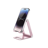 Soporte para Teléfono Celular de Aluminio / Angulo Ajustable / Amplia Compatibilidad con dispositivos de 4.7'' a 7.9'' / Antideslizante / Antiarañazos / Plegable / Color Rosa