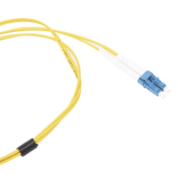 Jumper de Fibra Óptica Monomodo (OS2), XGLO, Riser, LC/UPC-LC/UPC Duplex, OFNR, Color Amarillo, 1 Metro (3.28 Pies)
