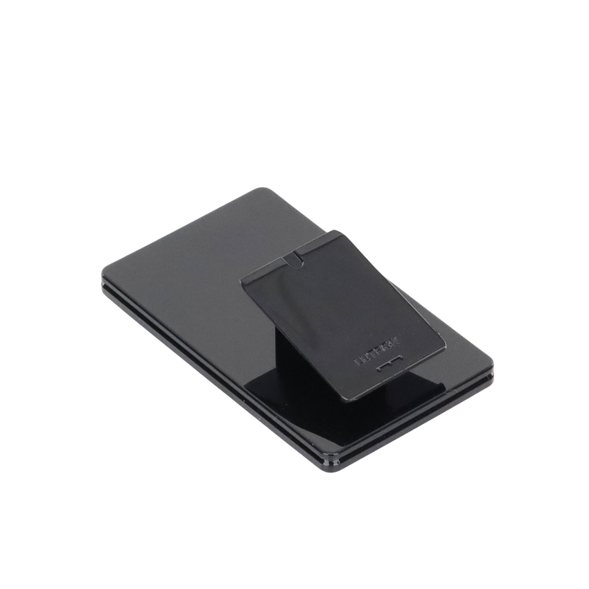 Base de mesa para un control remoto inalámbrico LUTRON. Con goma para evitar deslizamiento.