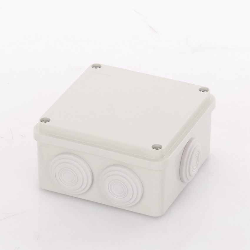Caja Derivación-Conexión de Plástico (100 X 100 X 54 mm) con 7 Glándulas de Goma. Para Instalaciones Comerciales, Residenciales e Industriales. Incluye Tornillería para su Tapa.